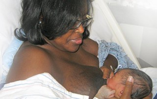 african american mother breastfeeding