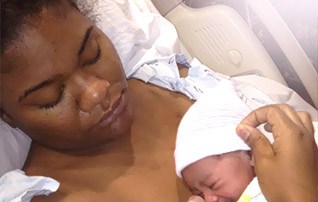 african-american mother with newborn baby