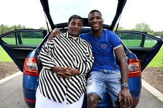 Chelsea Unveil New Signing Moises Caicedo poses alongside his mother at Chelsea Training Ground on August 14, 2023 in Cobham, England.